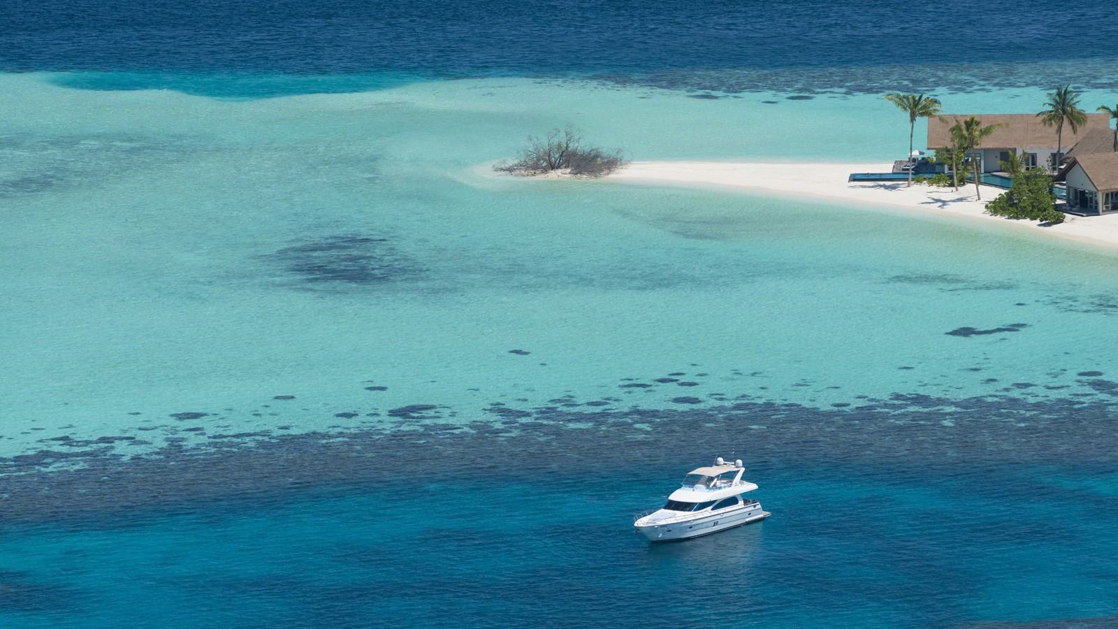 Maldives Private Island Stay Includes a 19m Yacht — official Four Seasons Private Island Maldives at Voavah image