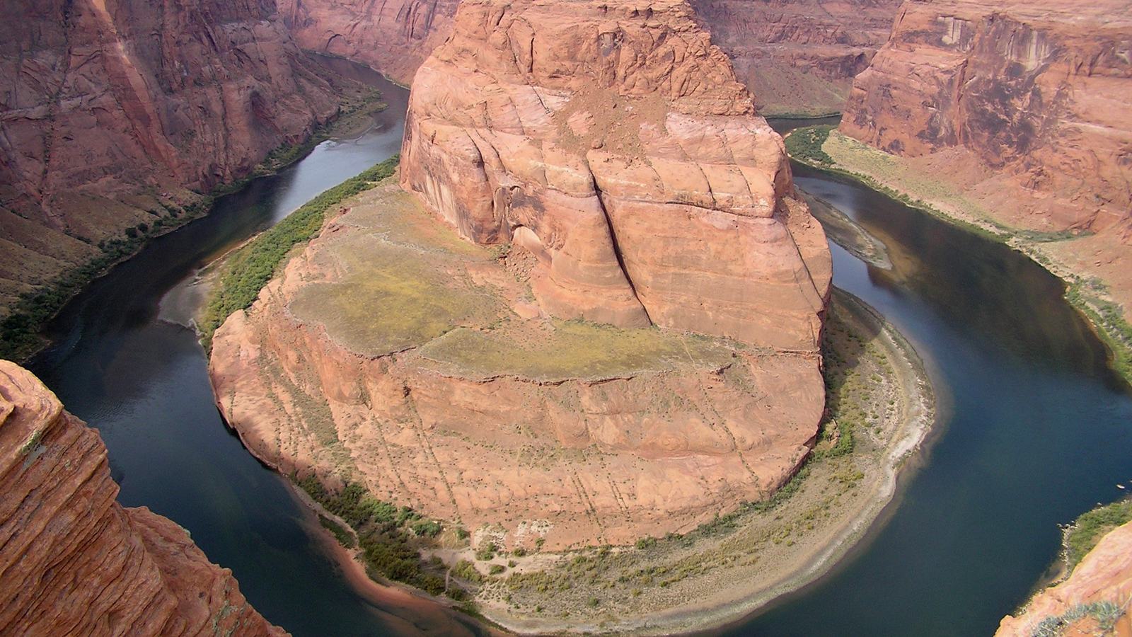 National Park Service, Colorado River winding between cliffs in Glen Canyon