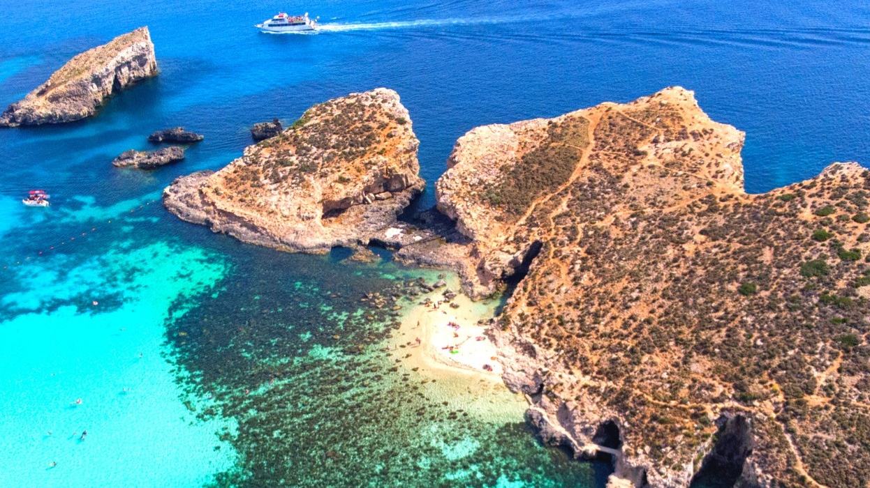 Malta Tourism Authority / VisitMalta — official photograph of the Blue Lagoon at Comino