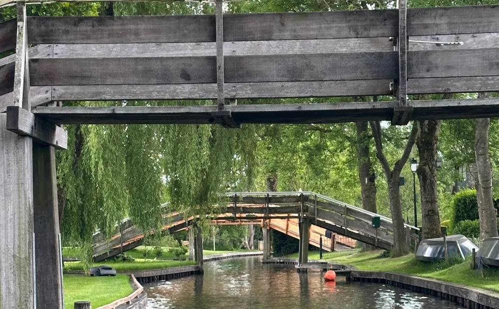 Official Giethoorn City boat-rental photography of the village's canal landscape