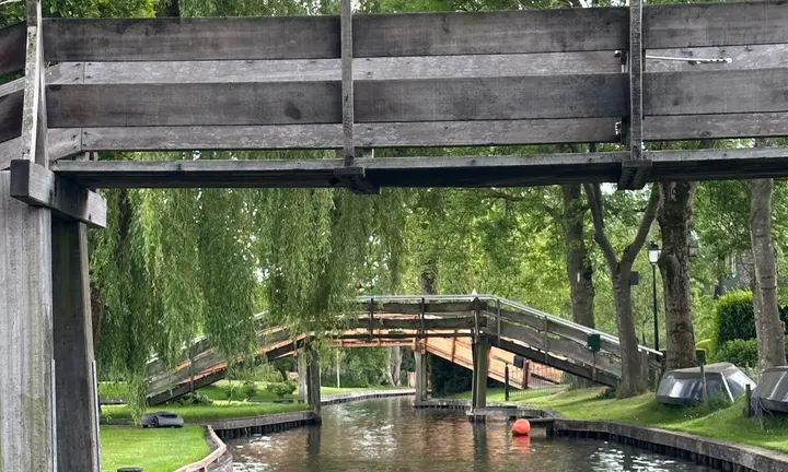 Official Giethoorn City boat-rental photography of the village's canal landscape