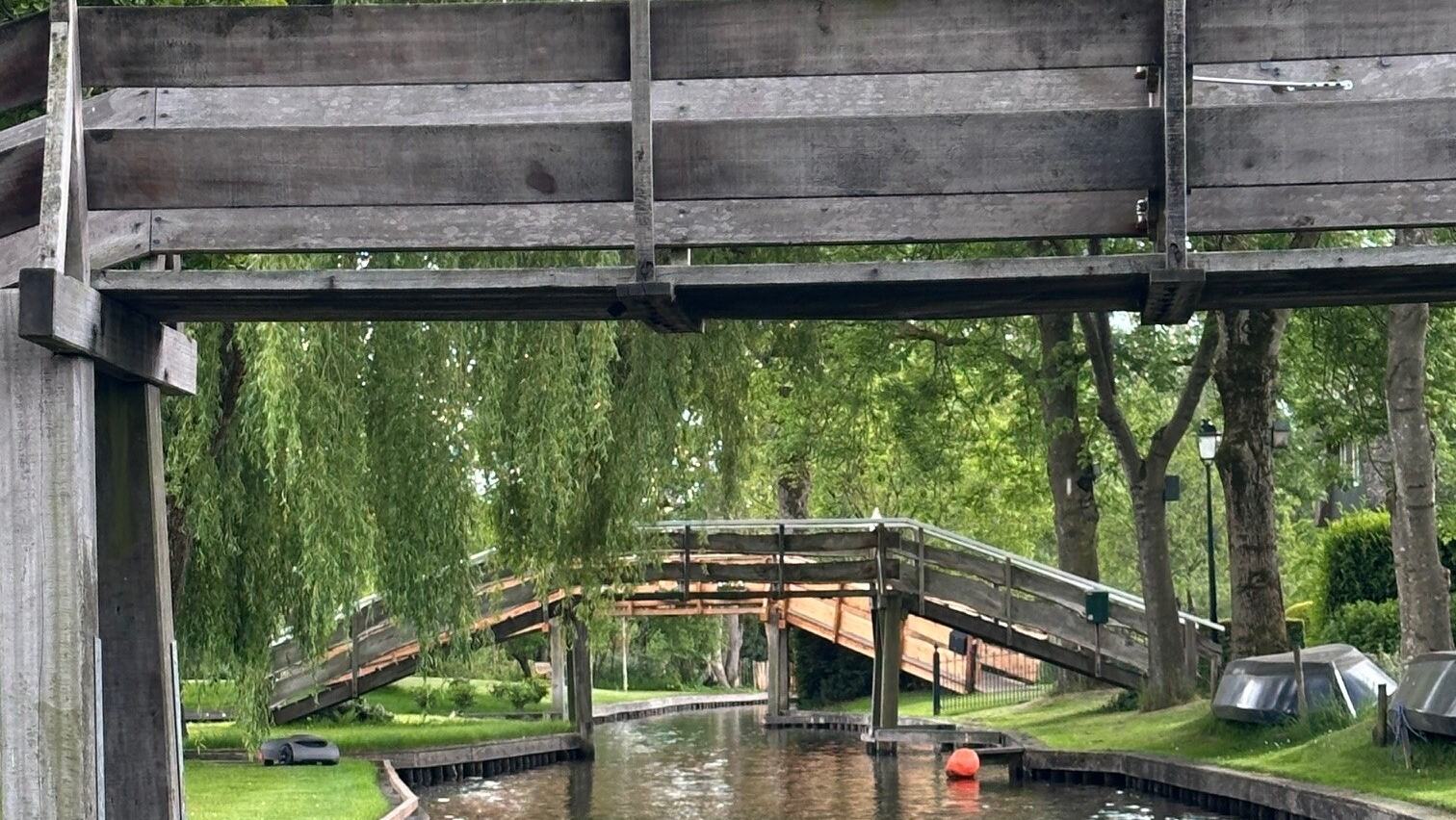 Official Giethoorn City boat-rental photography of the village's canal landscape