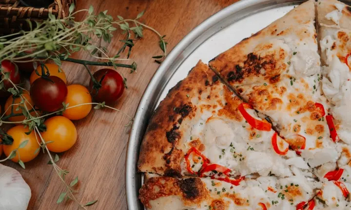 Harbor & Hearth Brings Rooftop Pizza to Baltimore’s Inner Harbor — official press image | Official source: https://press.fourseasons.com/baltimore/hotel-news/2026/harbor-hearth/