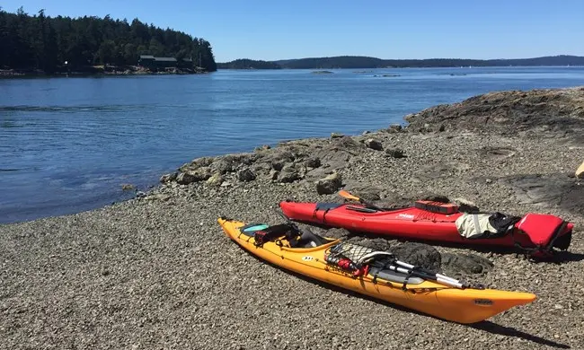 Bureau of Land Management via National Park Service — kayakers on the Salish Sea | San Juan Island by Sea Kayak: Salish Sea Beauty and the Skills It Demands