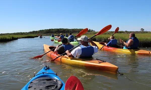 National Park Service — kayakers on Assateague's bayside | Assateague’s Bayside by Kayak: Wild Shorelines Without Chasing the Horses
