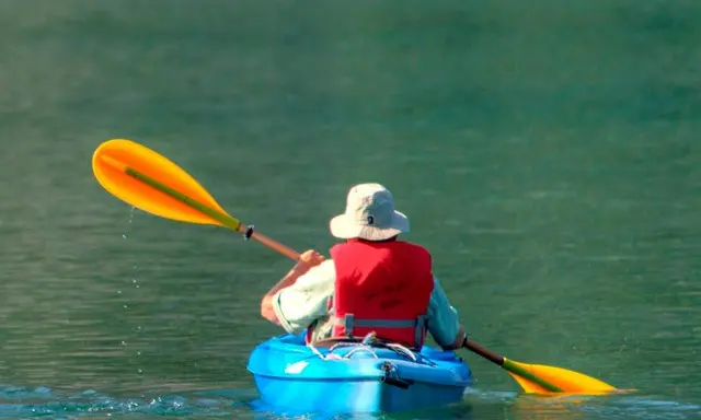 National Park Service — two kayakers on a North Cascades lake | Ross Lake by Small Boat: North Cascades Scenery With Serious Cold-Water Rul