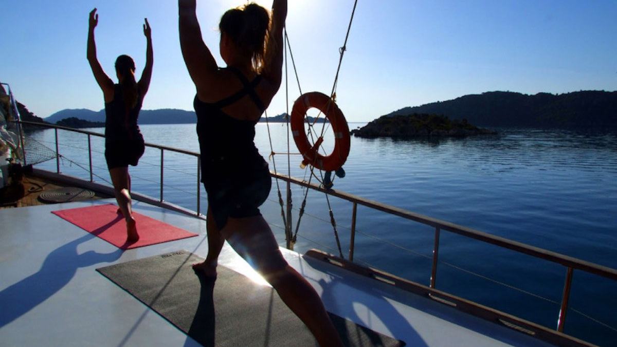 Boat Yoga on a Calm Morning: Gentle Stretches Without Leaving the Dock — official Discover Boating, Boat Yoga: Five Poses to Do Onboard image