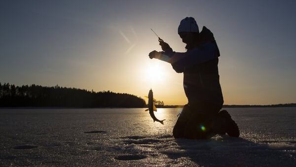 10 Tips for Ice Fishing Success: A Winter Angler's Guide — official Discover Boating image