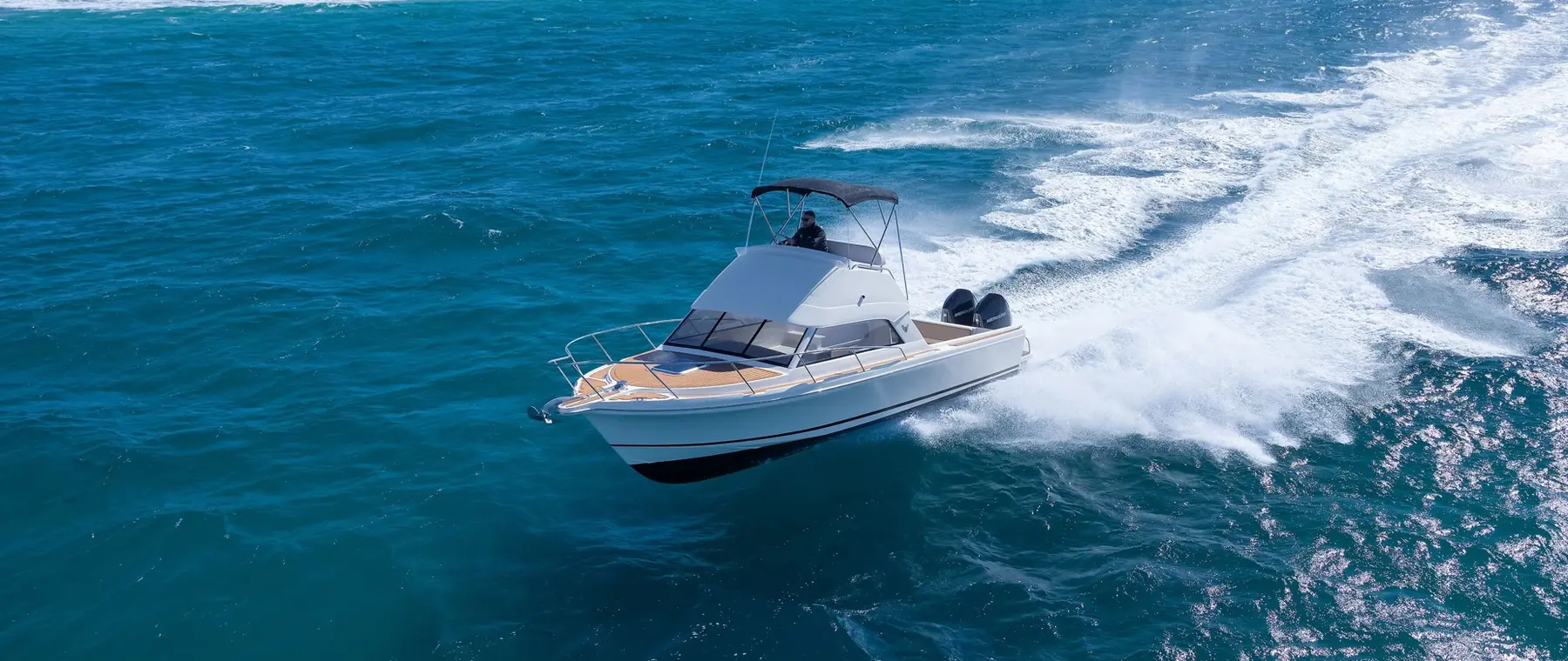 Caribbean Boats official photograph of the 27F flybridge underway | Caribbean Shows Revived 40F and 27F Flybridge Boats in Melbourne