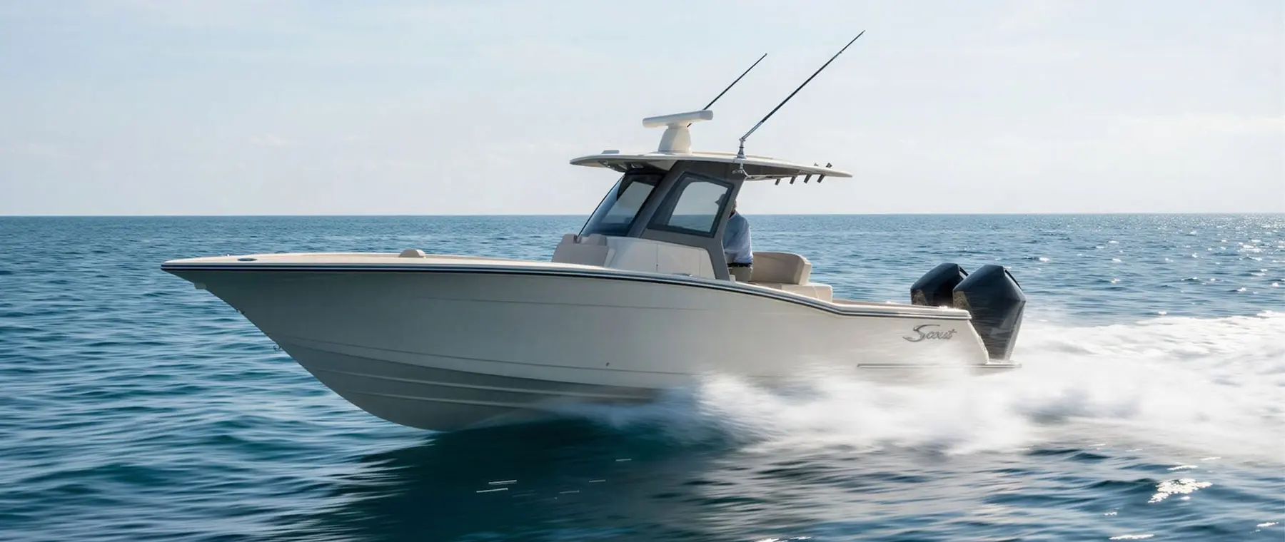 Official boat-builder photograph | Scout 315 LXF heads for Fort Lauderdale with twin powered beach platforms