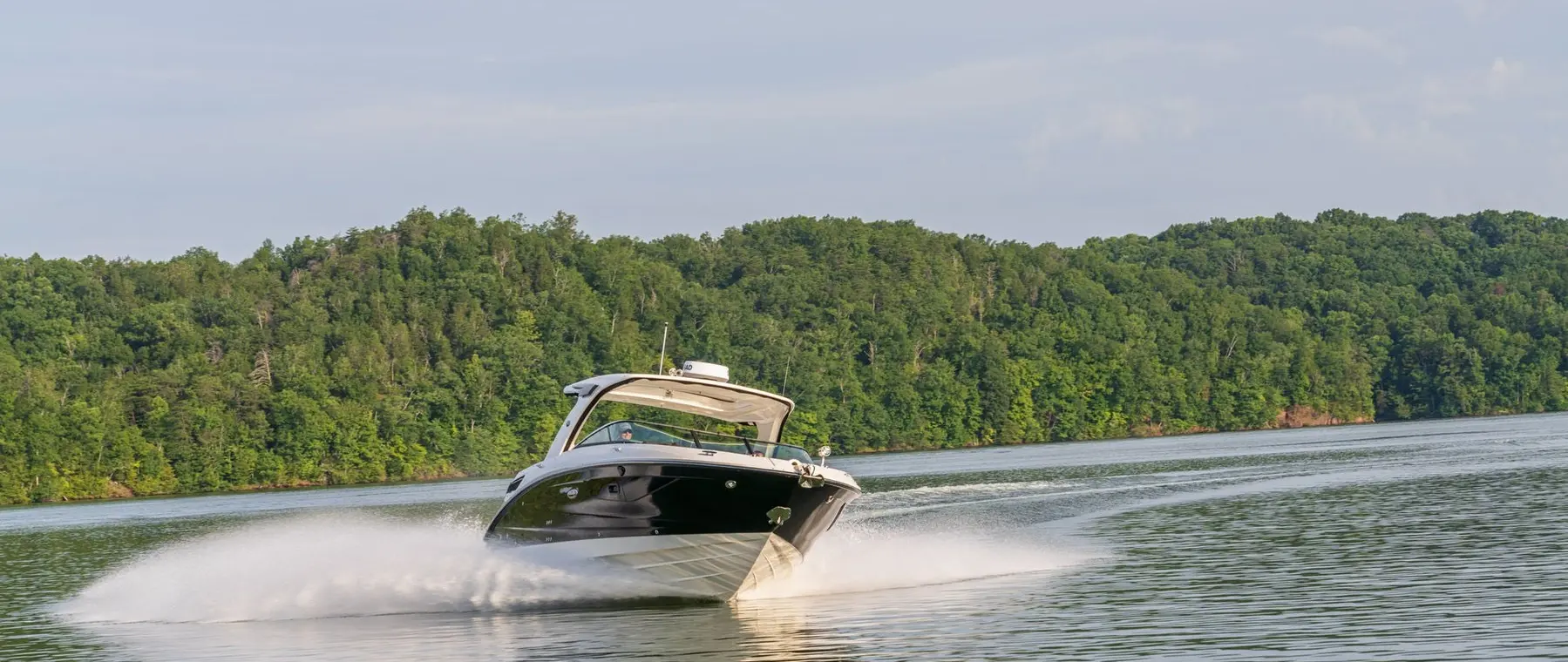 Official boat-builder photograph | Sea Ray SLX 350 Uses Joystick Sterndrives and an Air-Conditioned Hideaway