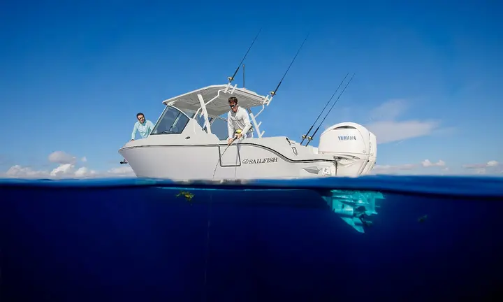 Official boat-builder photograph | Sailfish 256 DC adds four-position seating and side boarding to 2027 range