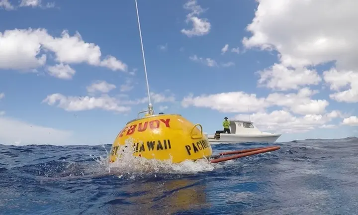 NOAA IOOS / PacIOOS — wave observation buoy photograph from October 2026 newsletter