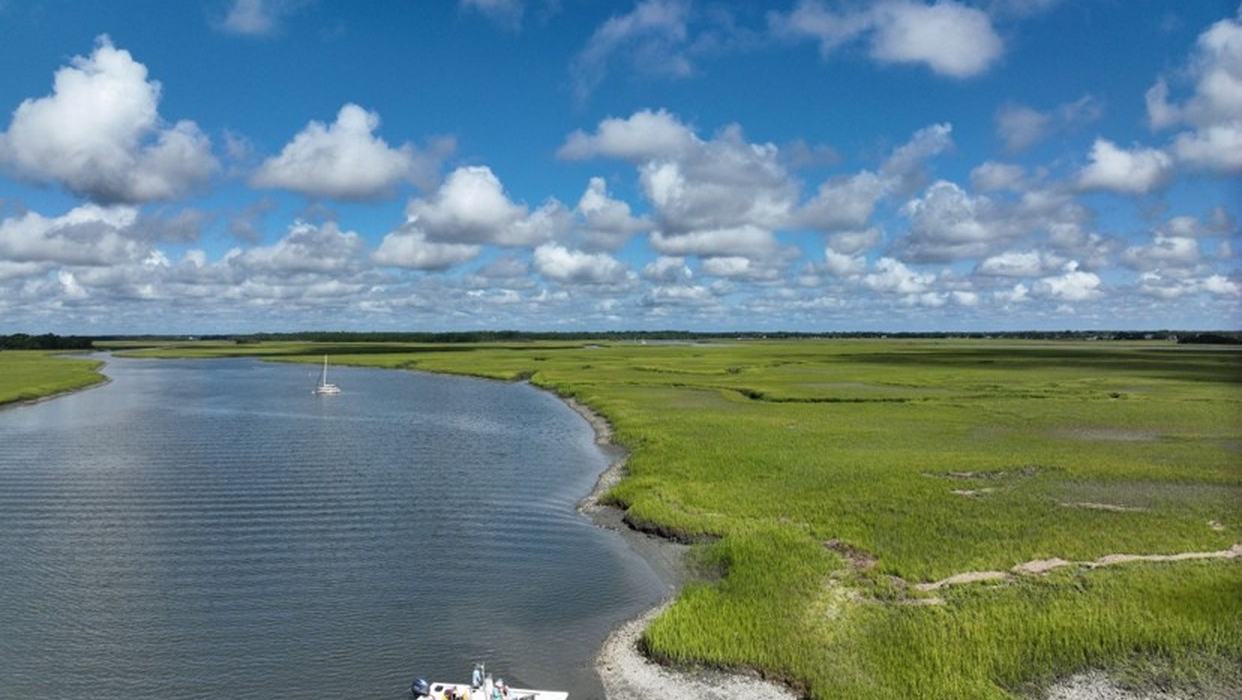 NOAA NCCOS / Brandon Puckett — aerial view of oyster reefs in Folly River, South Carolina
