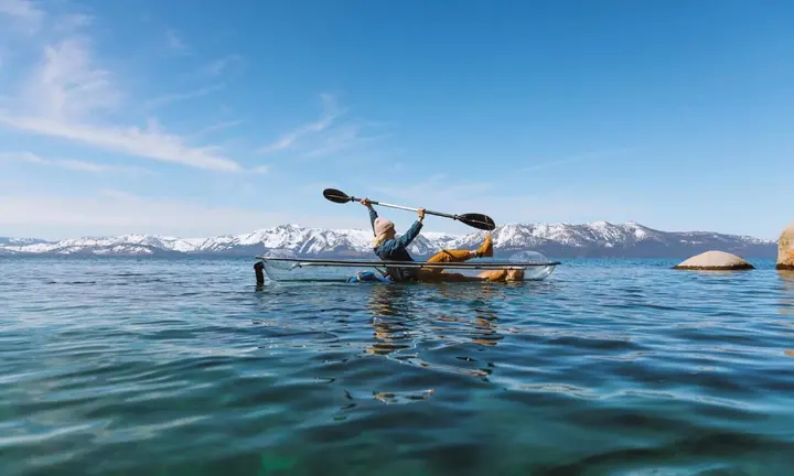 Official Visit Lake Tahoe destination photography: clear kayak on Lake Tahoe